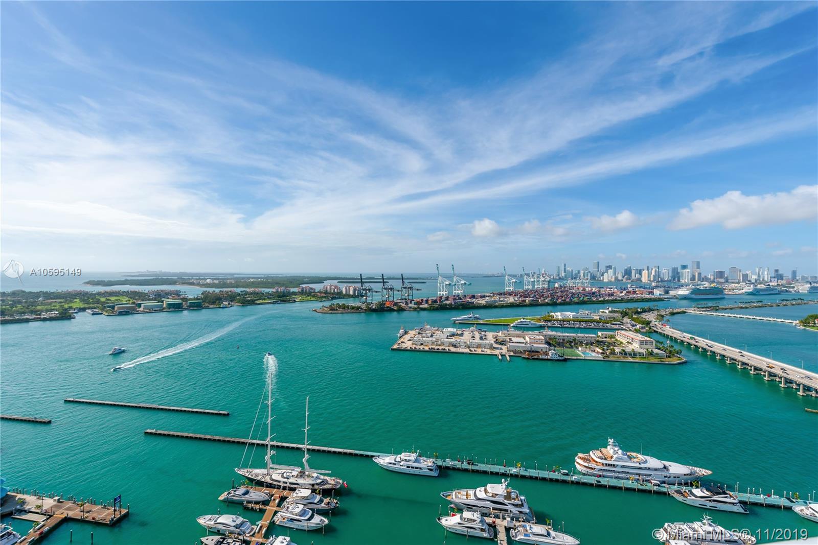 400 Alton Road, Unit 3403 Miami Beach, FL 33139 - Photo 3 of 10 a view of a lake with a city