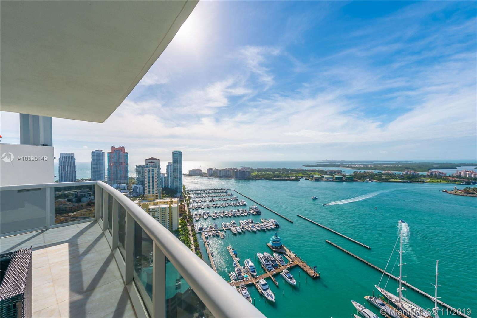 400 Alton Road, Unit 3403 Miami Beach, FL 33139 - Photo 5 of 10 a view of a city from a balcony