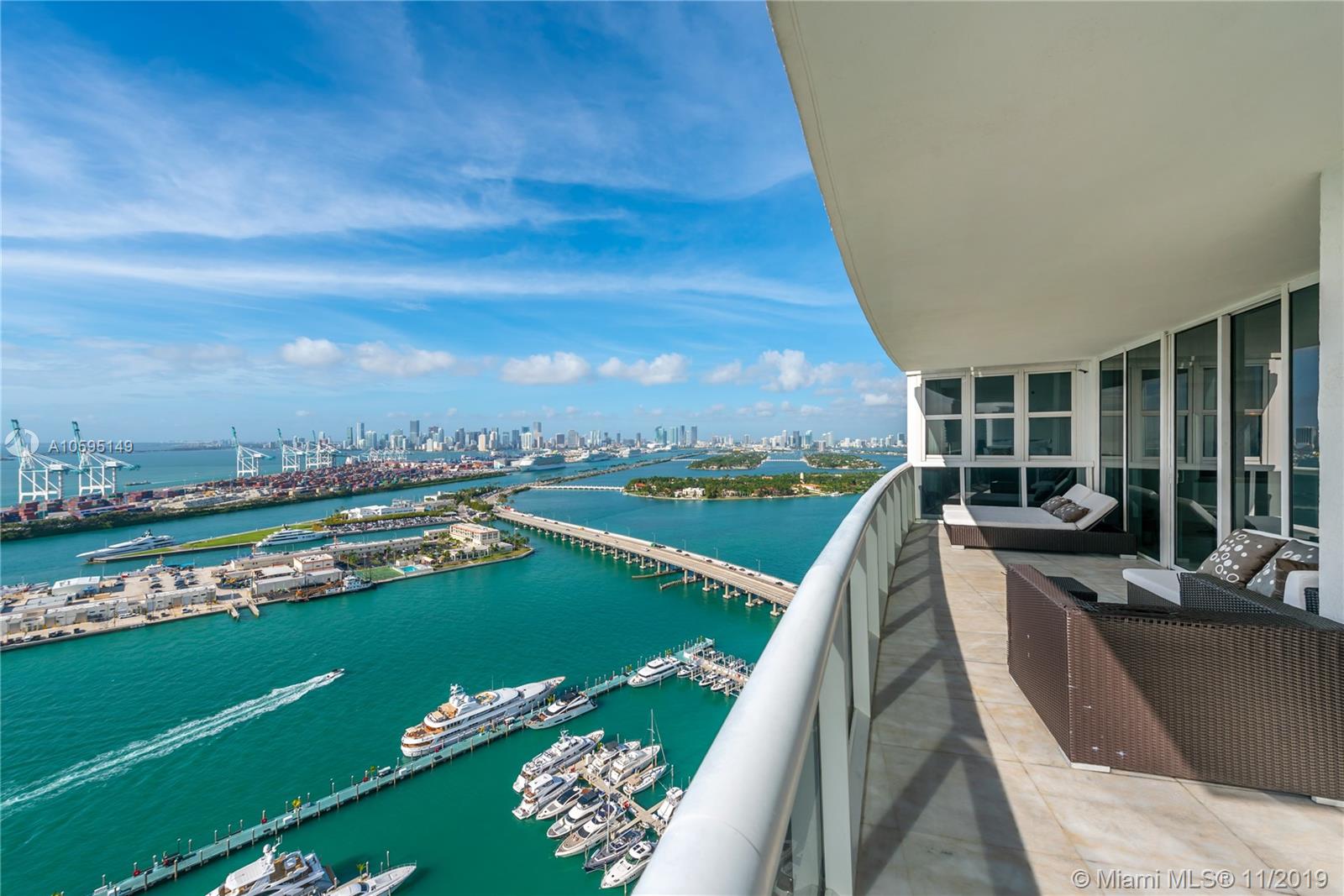 400 Alton Road, Unit 3403 Miami Beach, FL 33139 - Photo 6 of 10 a view of a swimming pool with a lake view