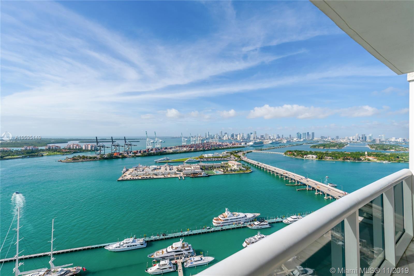 400 Alton Road, Unit 3403 Miami Beach, FL 33139 - Photo 7 of 10 a view of a city street view with a lake view