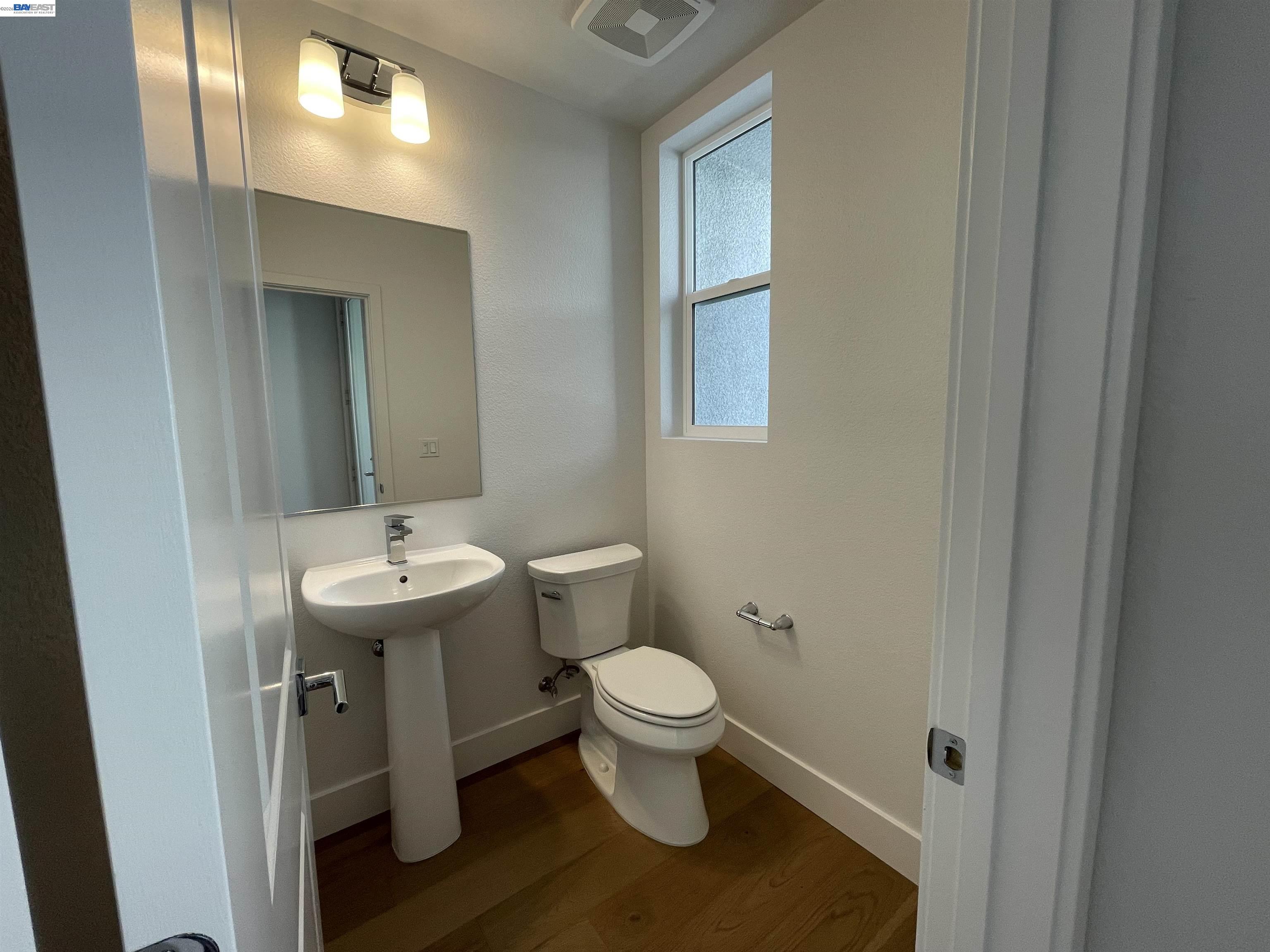 5708 Melon Court San Ramon, CA 94583 - Photo 11 of 31 a bathroom with a sink toilet and a mirror