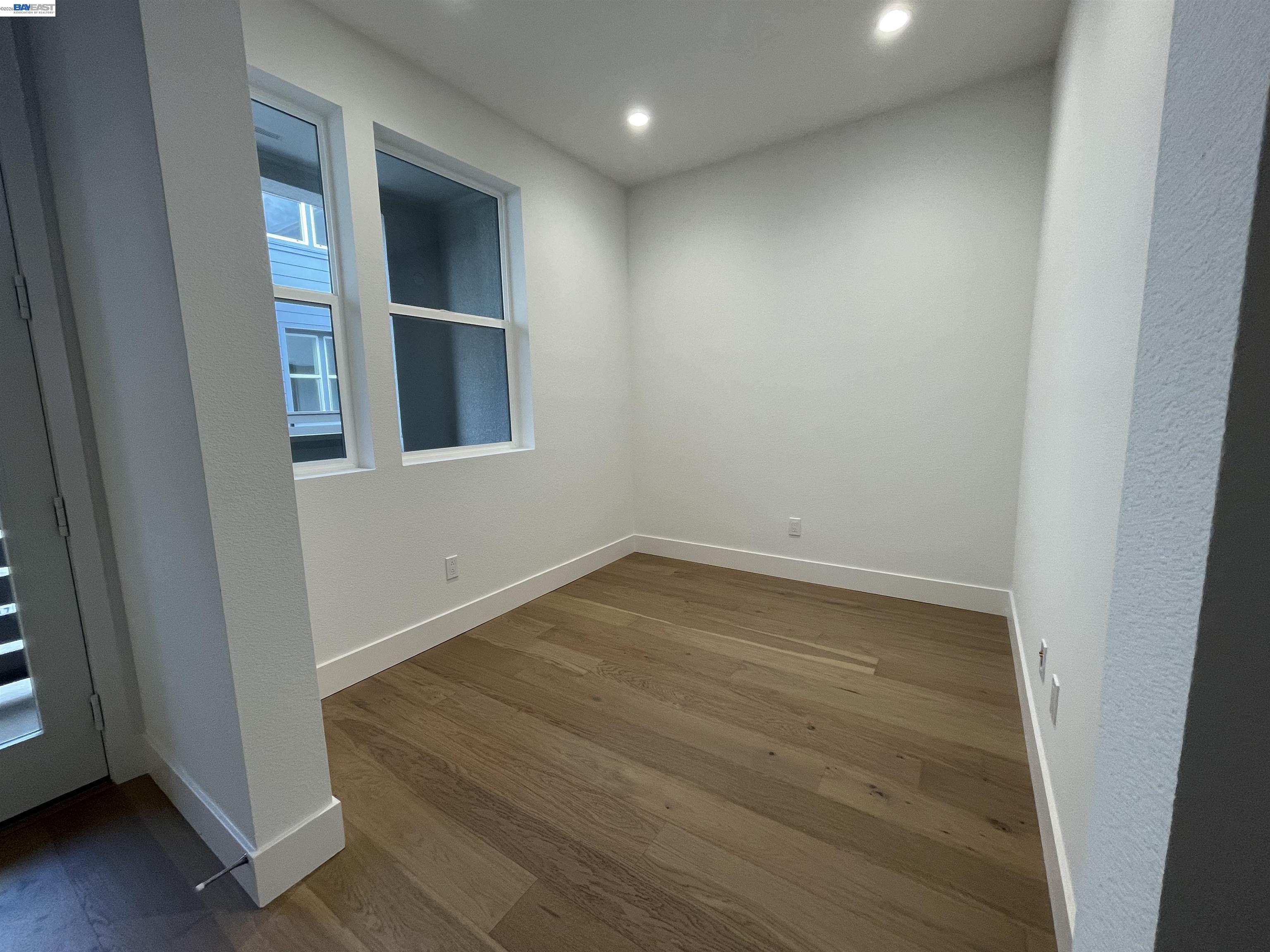 5708 Melon Court San Ramon, CA 94583 - Photo 22 of 31 an empty room with wooden floor and entrance