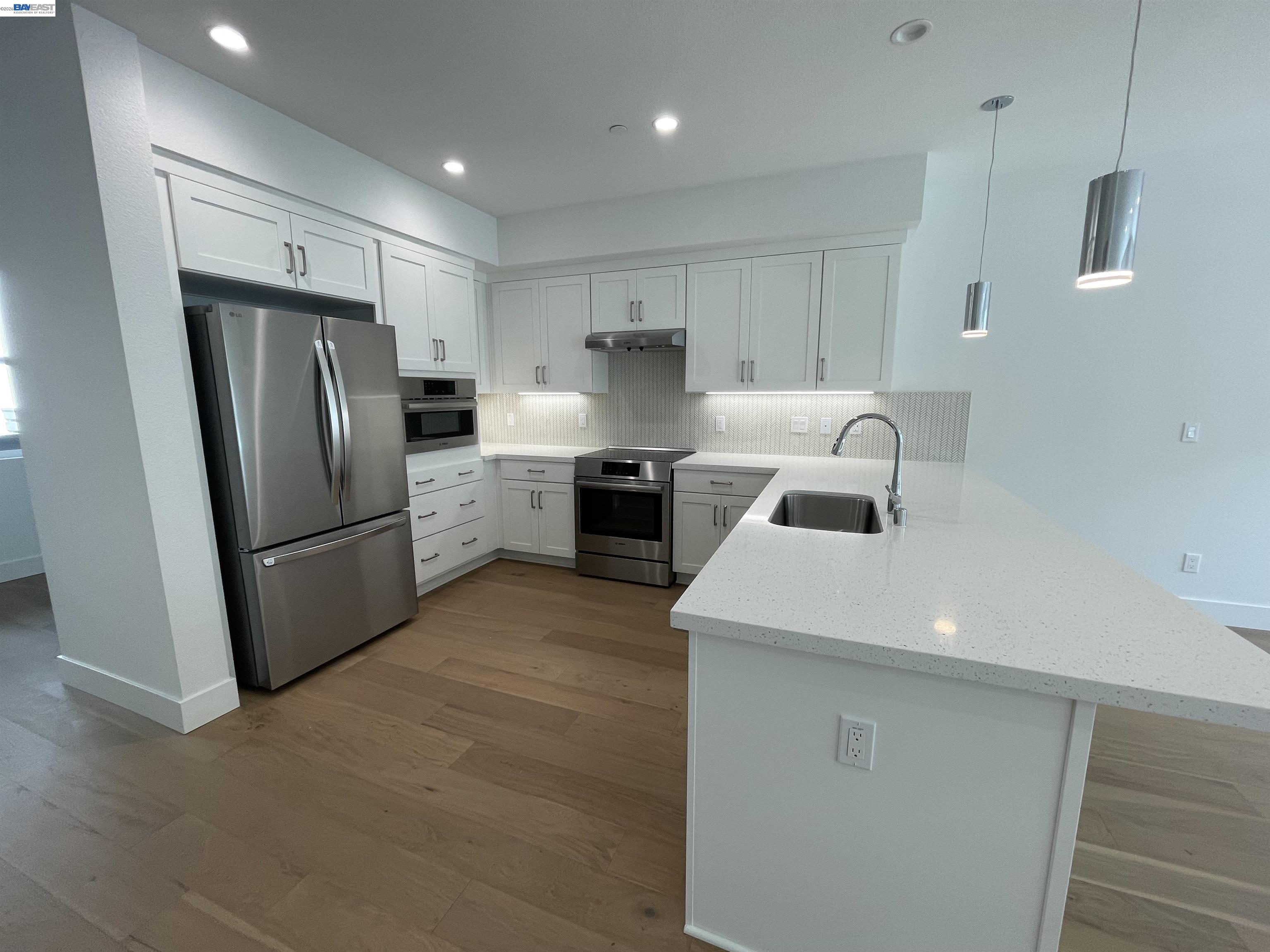 5708 Melon Court San Ramon, CA 94583 - Photo 24 of 31 a kitchen with refrigerator and stove