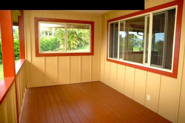55 Ulumalu Road Haiku, HI 96708 - Photo 23 of 26 a view of an empty room with wooden floor and a window