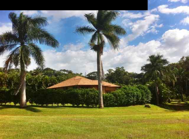 55 Ulumalu Road Haiku, HI 96708 - Photo 26 of 26 a view of swimming pool with lawn chairs under an umbrella