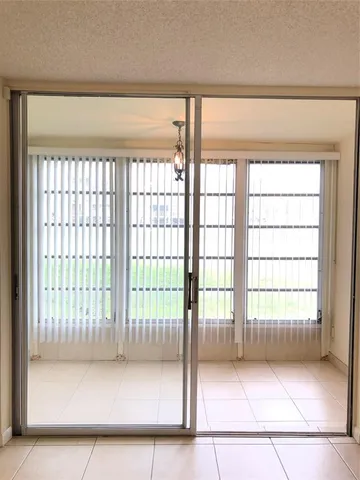 a view of a room with a staircase