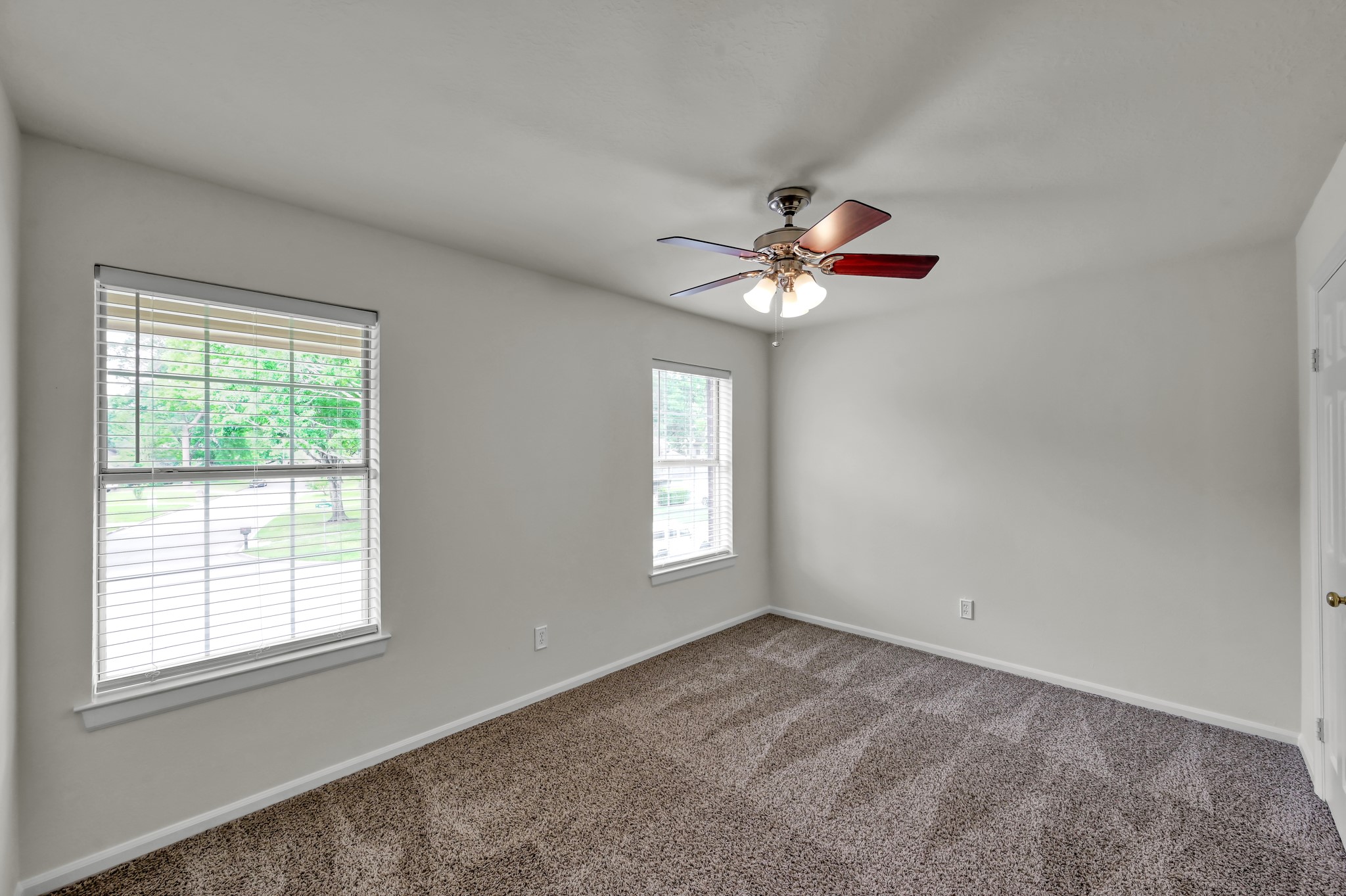 114 Regency Way Conroe, TX 77304 - Photo 37 of 48 Bedroom #5 of 5 with ceiling fan and large closet.