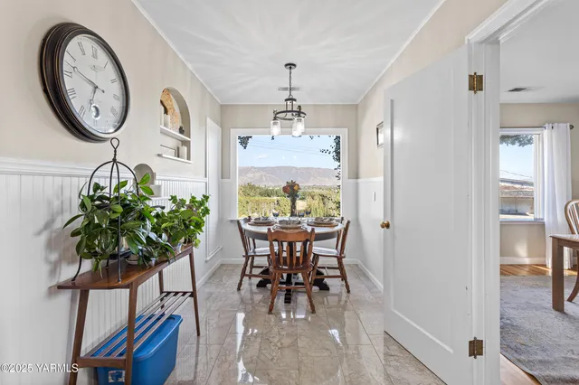a kitchen with stainless steel appliances granite countertop a refrigerator and a stove