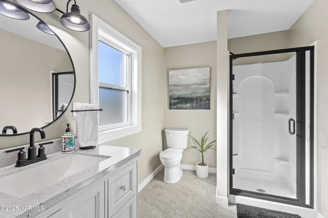 a bathroom with a sink a mirror and a bathtub