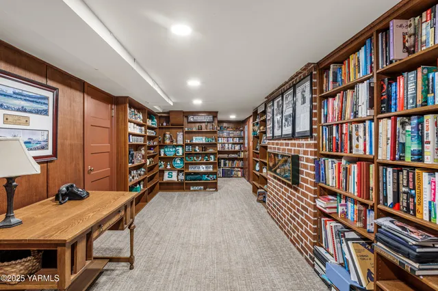 an empty room with a empty space and windows