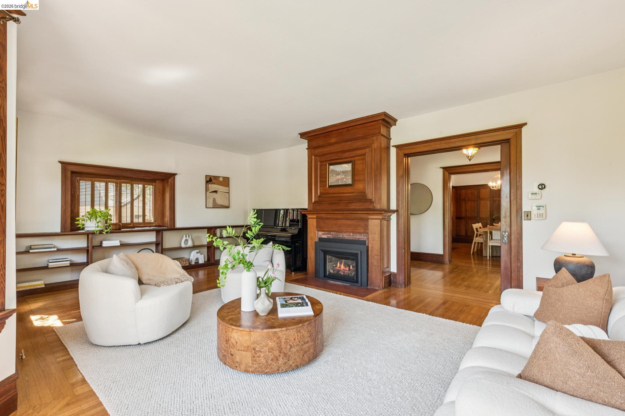1490 Arch Street Berkeley, CA 94708 - Photo 11 of 57 a living room with furniture and a fireplace