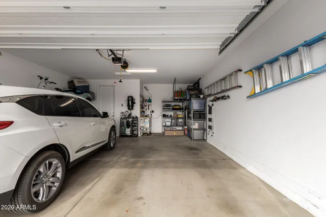 a view of parking garage with cars