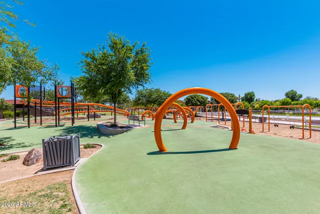 a view of swimming pool having outdoor seating