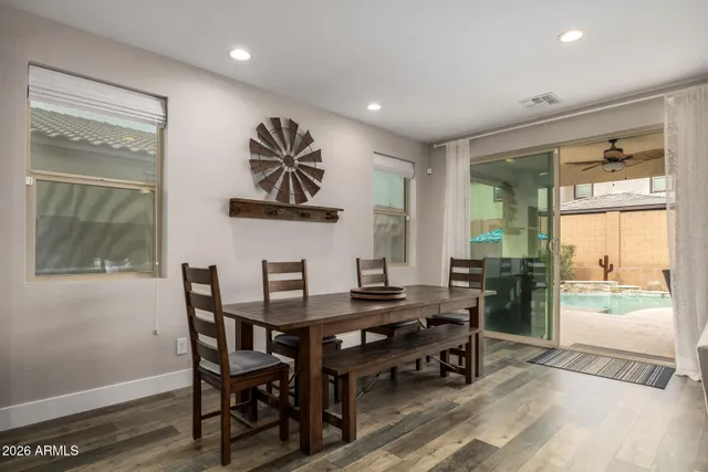 a view of a dining room with furniture window and outside view