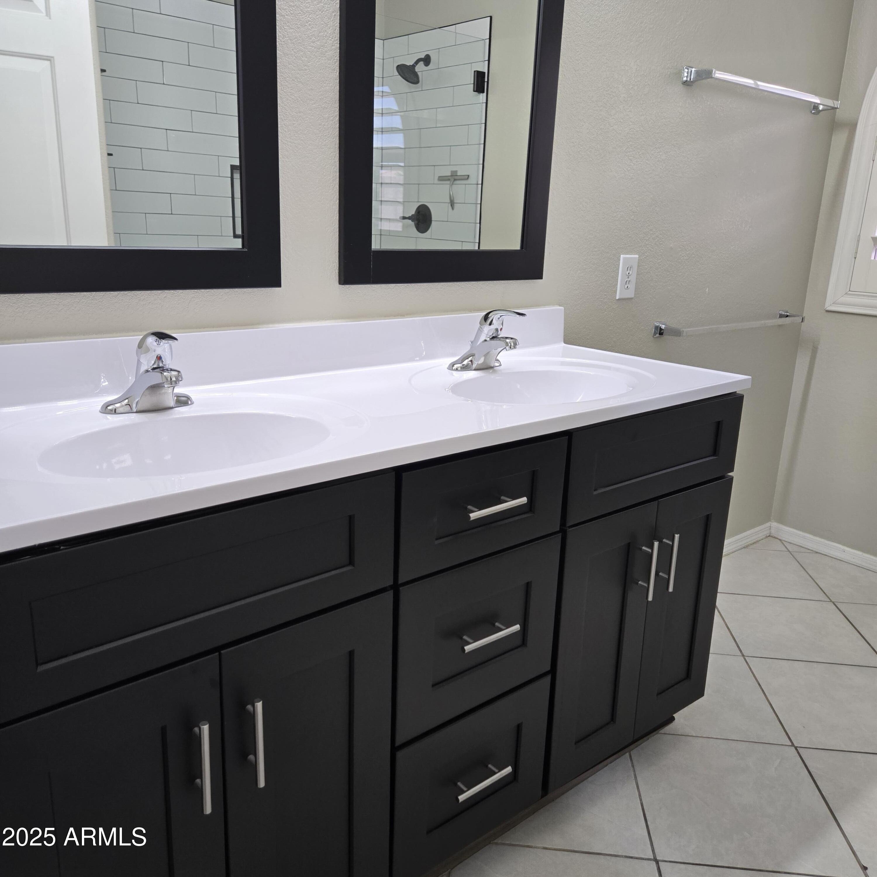 11525 West Cottontail Court Surprise, AZ 85378 - Photo 12 of 21 a bathroom with a sink vanity and mirror