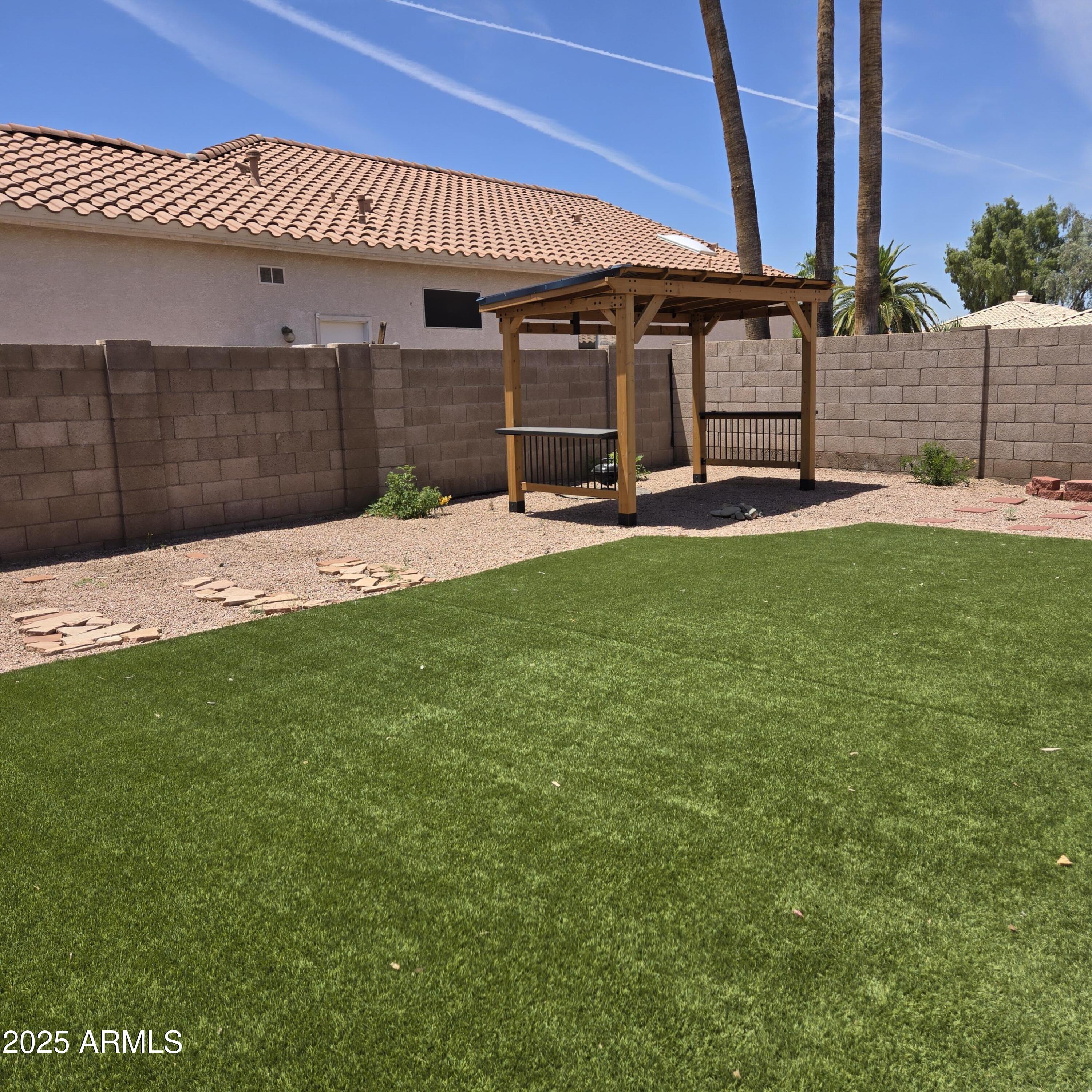 11525 West Cottontail Court Surprise, AZ 85378 - Photo 21 of 21 a view of backyard with swimming pool