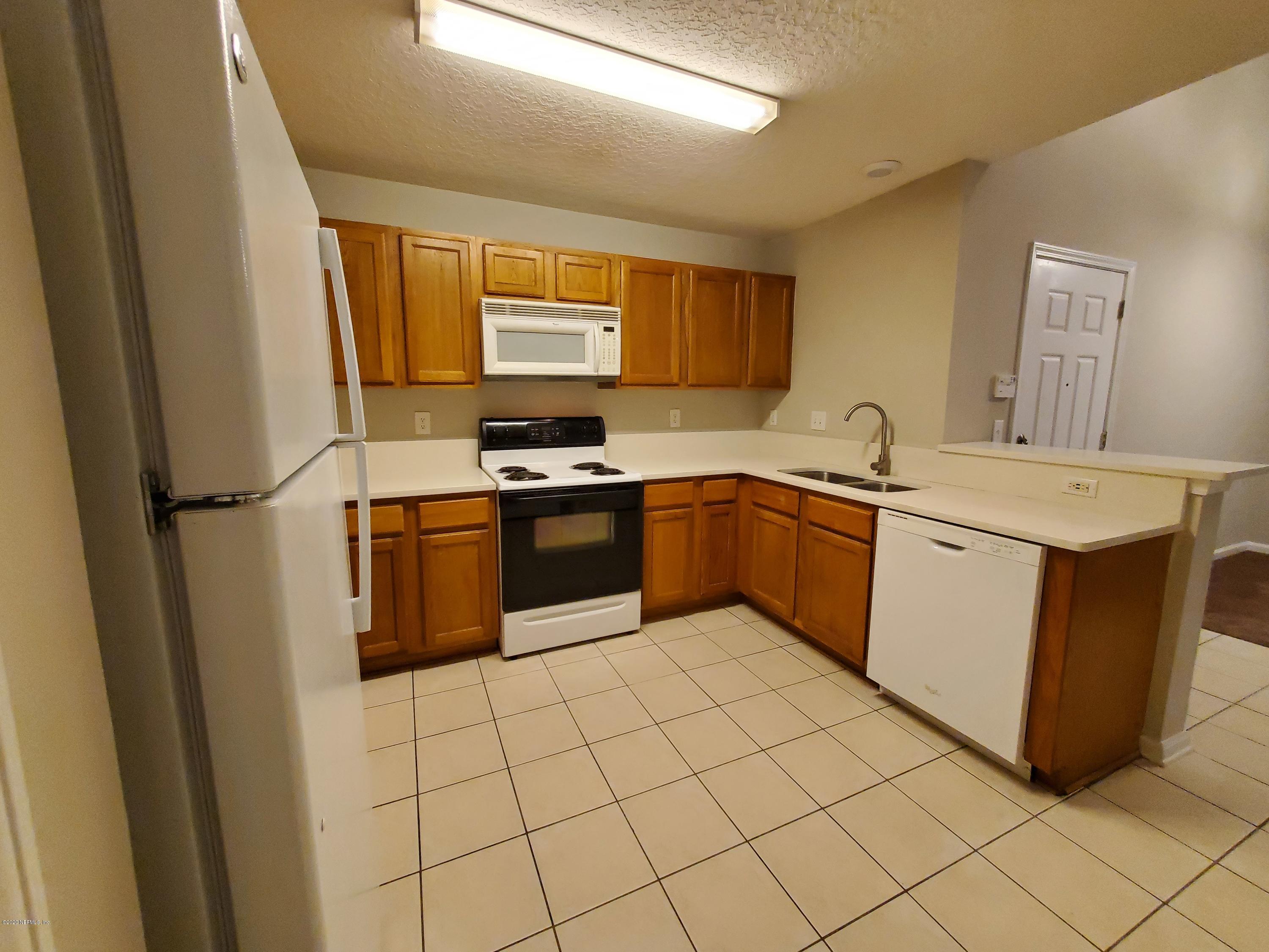 7920 Merrill Road, Unit 1216 Jacksonville, FL 32277 - Photo 4 of 15 Kitchen