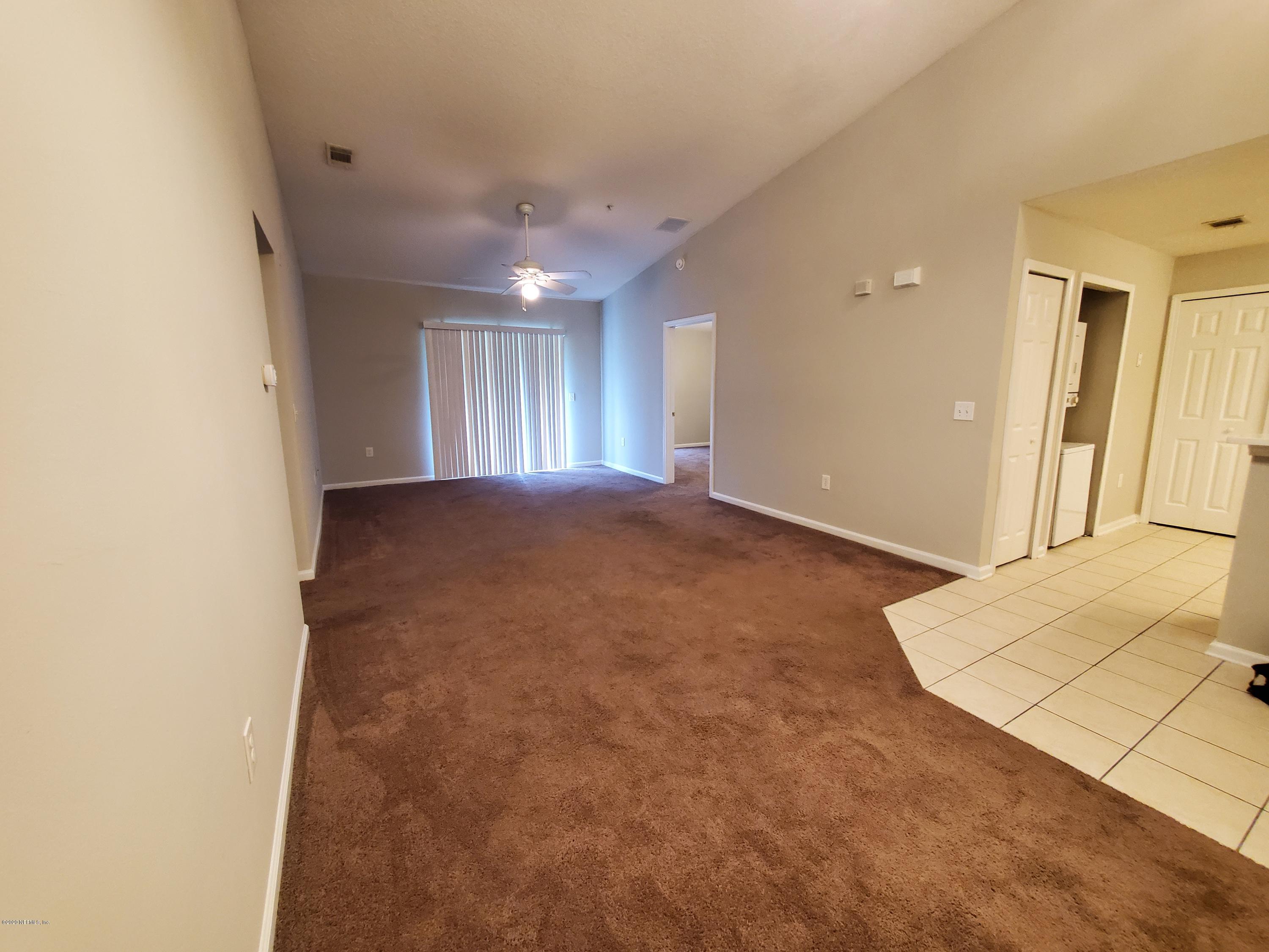 7920 Merrill Road, Unit 1216 Jacksonville, FL 32277 - Photo 5 of 15 livingroom