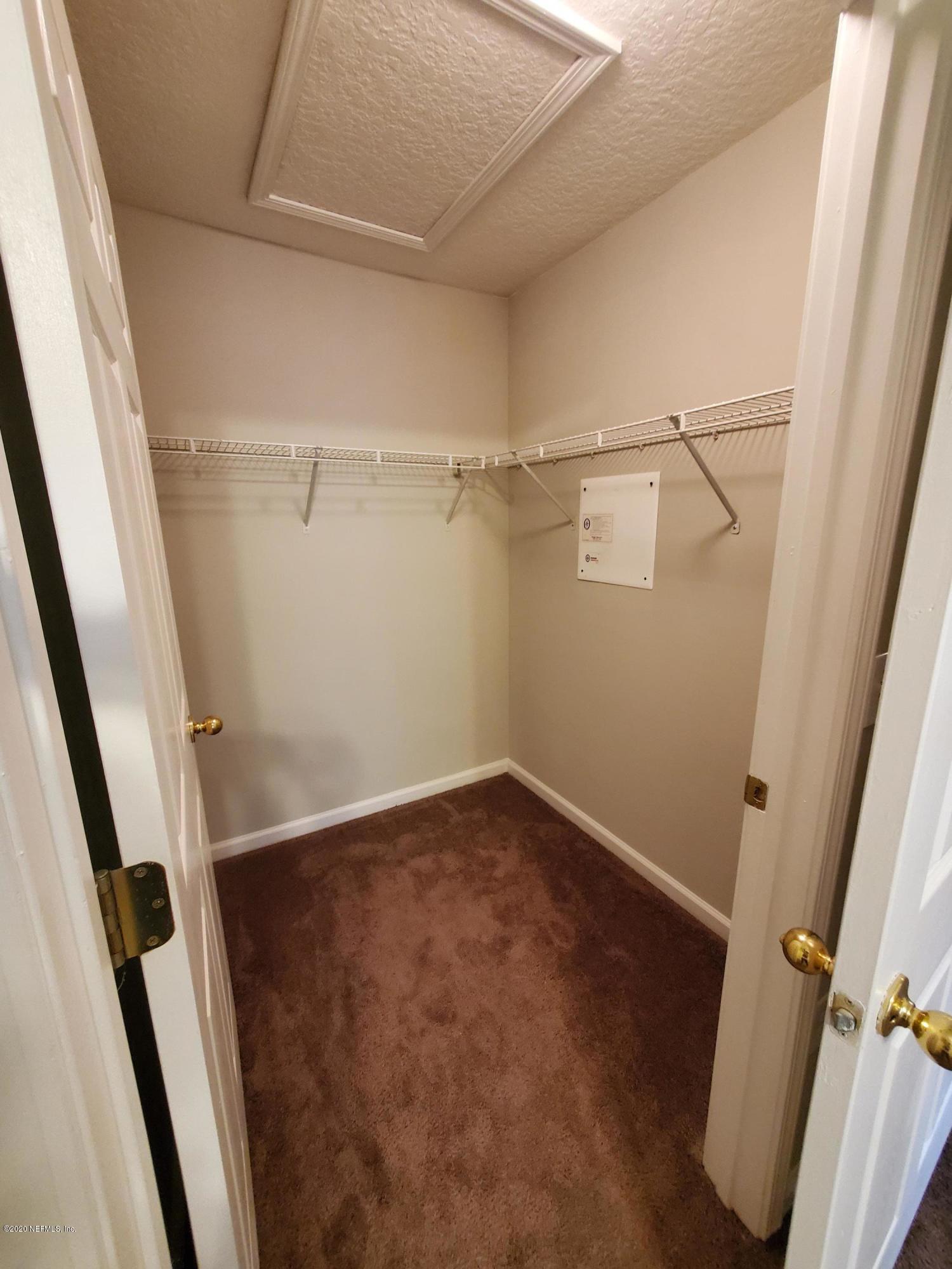 7920 Merrill Road, Unit 1216 Jacksonville, FL 32277 - Photo 10 of 15 master closet