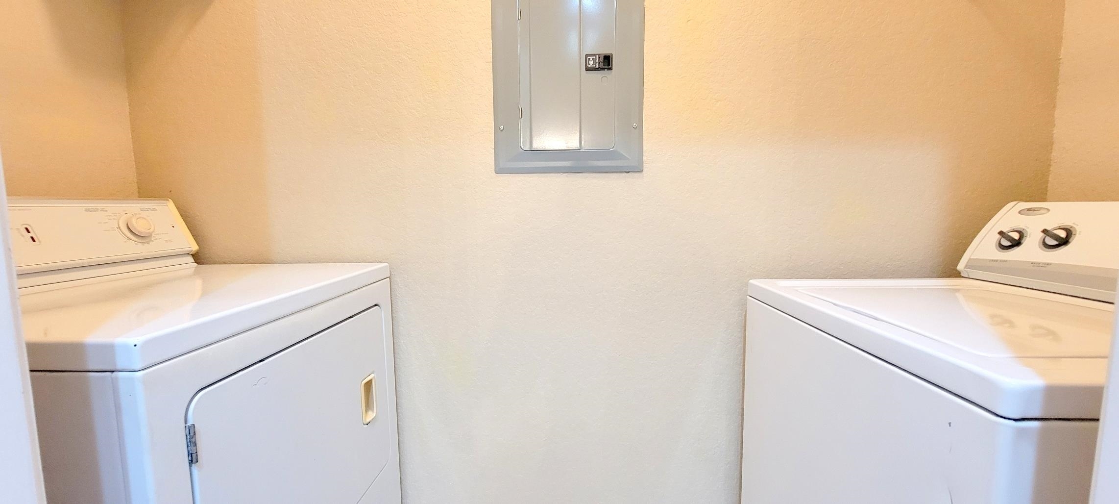 285 Old Village Center Circle, Unit 5206 St. Augustine, FL 32084 - Photo 12 of 17 a utility room with dryer and washer