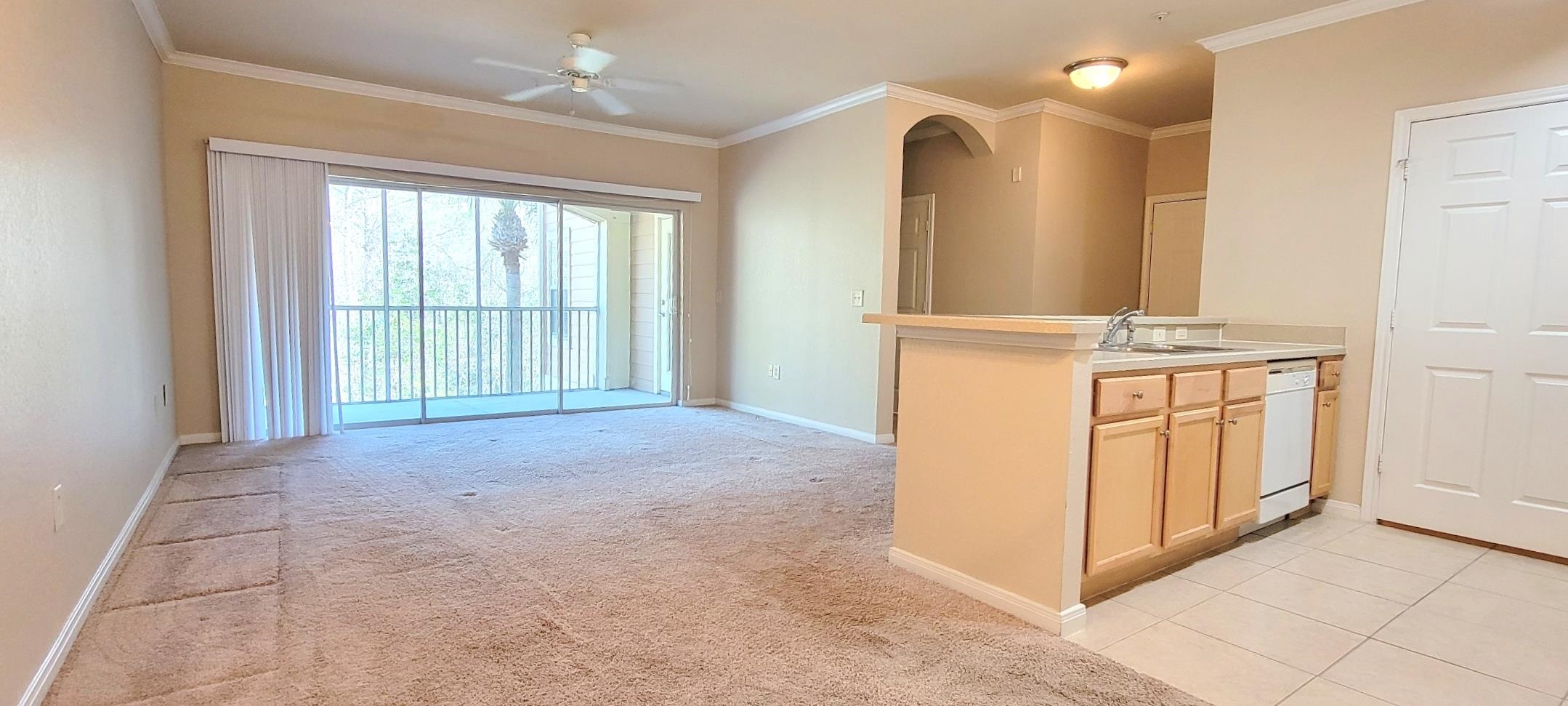 285 Old Village Center Circle, Unit 5206 St. Augustine, FL 32084 - Photo 5 of 17 an empty room with windows