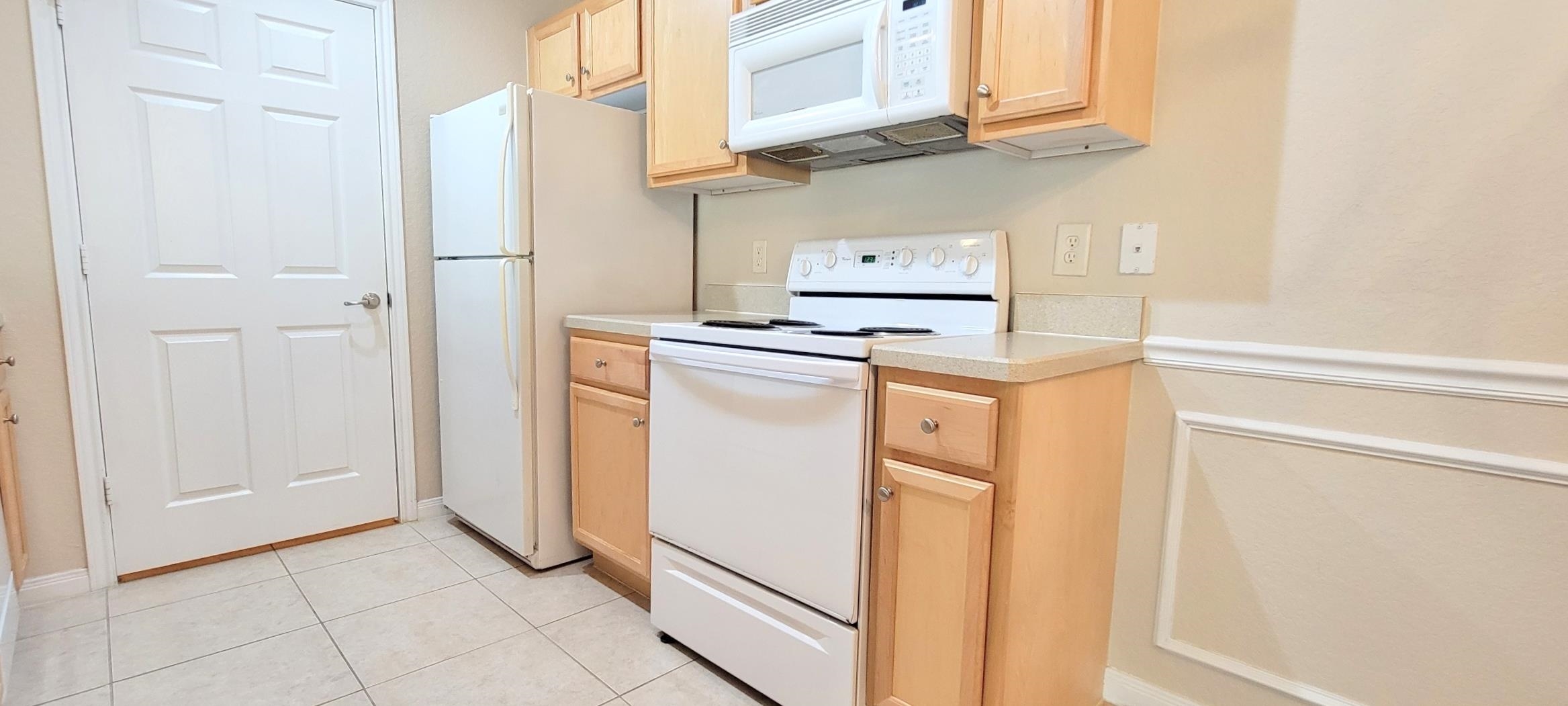 285 Old Village Center Circle, Unit 5206 St. Augustine, FL 32084 - Photo 10 of 17 a utility room with dryer and washer