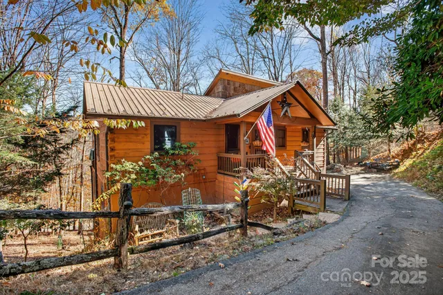 a view of a house with large windows