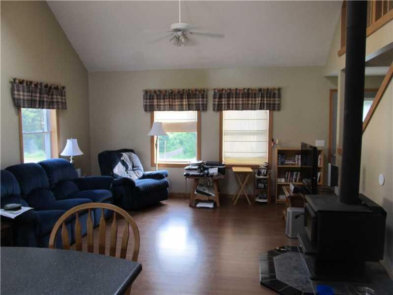 363 Pleasant View Ridge Road China, ME 04358 - Photo 11 of 35 Living Room. Lots of natural light...