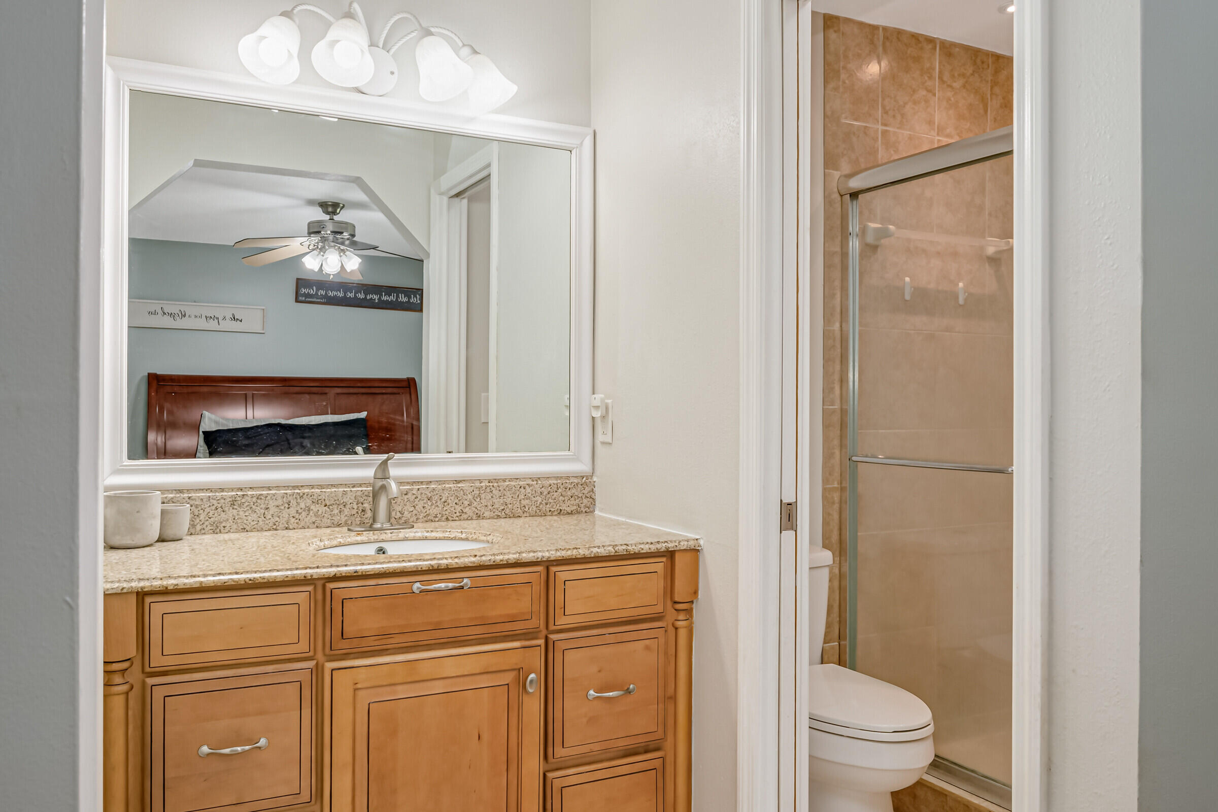 1030 San Rafael Road Southwest Palm Bay, FL 32908 - Photo 17 of 37 a bathroom with a sink toilet and shower