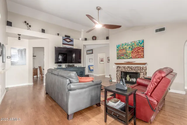 a kitchen with stainless steel appliances granite countertop sink stove top oven and cabinets
