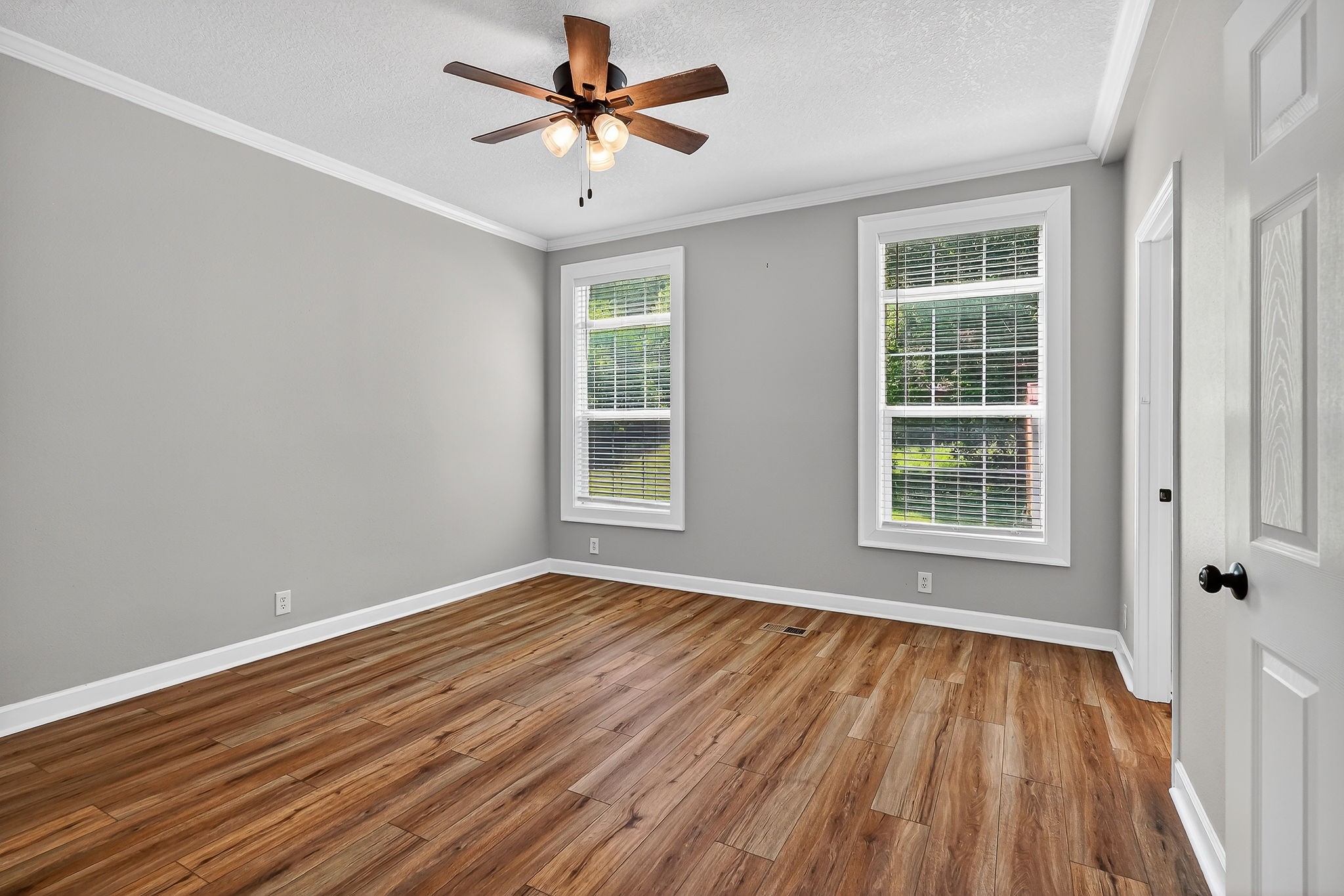 16062 Buffalo Valley Road Silver Point, TN 38582 - Photo 13 of 27 wooden floor in an empty room with a window