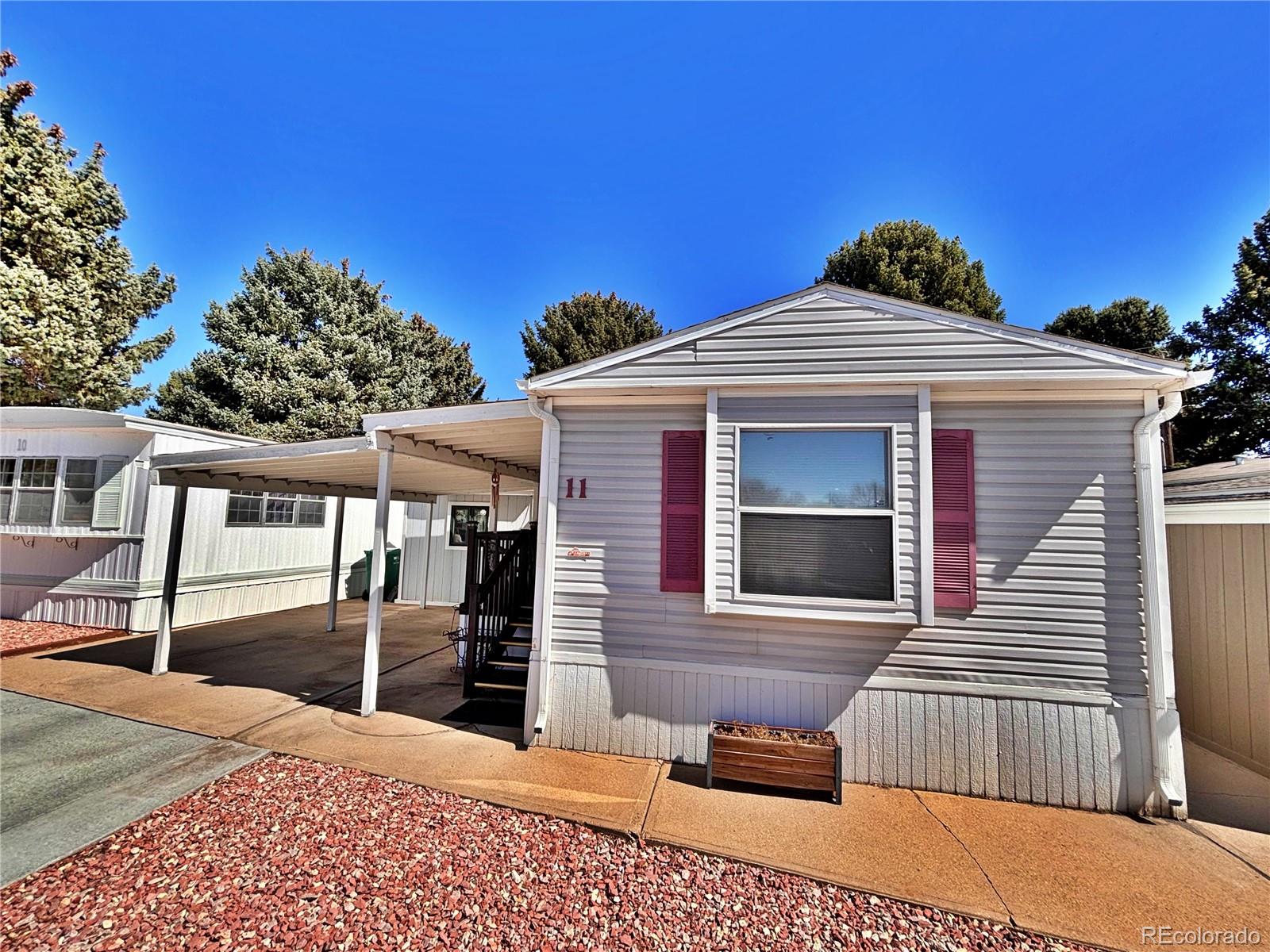 230 North 2nd Street Berthoud, CO 80513 - Photo 2 of 44 a front view of a house