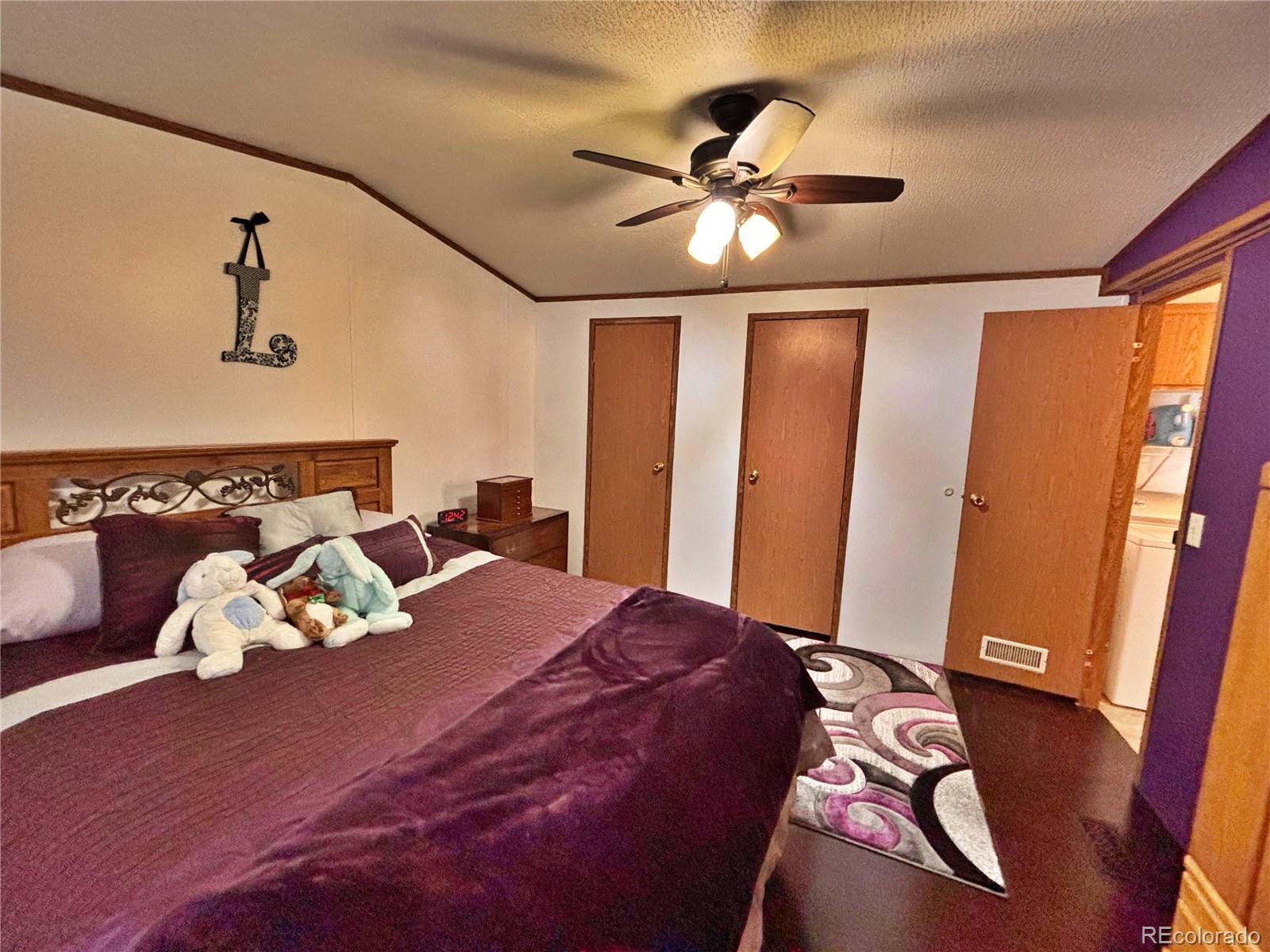 230 North 2nd Street Berthoud, CO 80513 - Photo 36 of 44 a bed room with a bed and a window