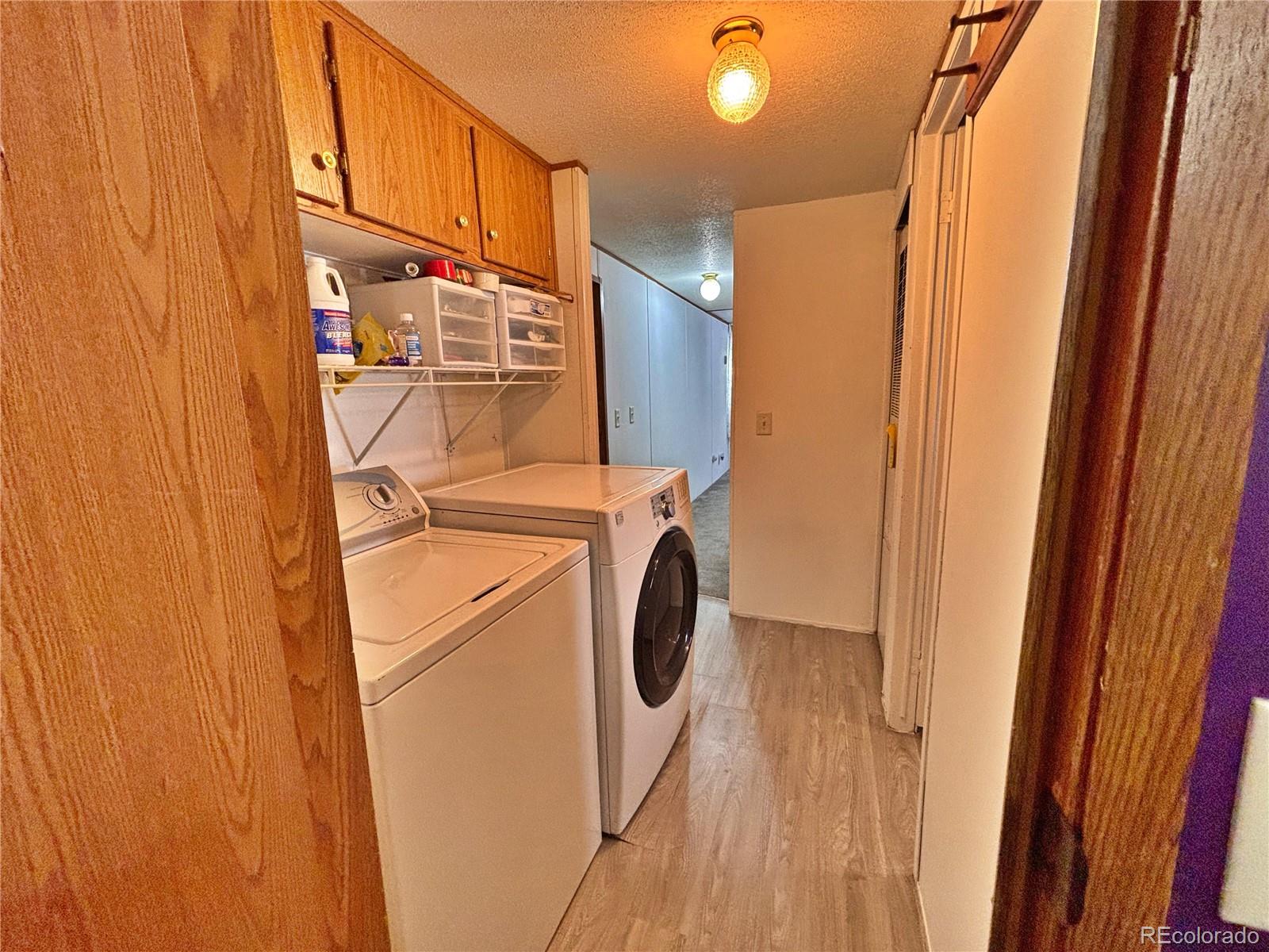 230 North 2nd Street Berthoud, CO 80513 - Photo 39 of 44 a utility room with dryer and washer