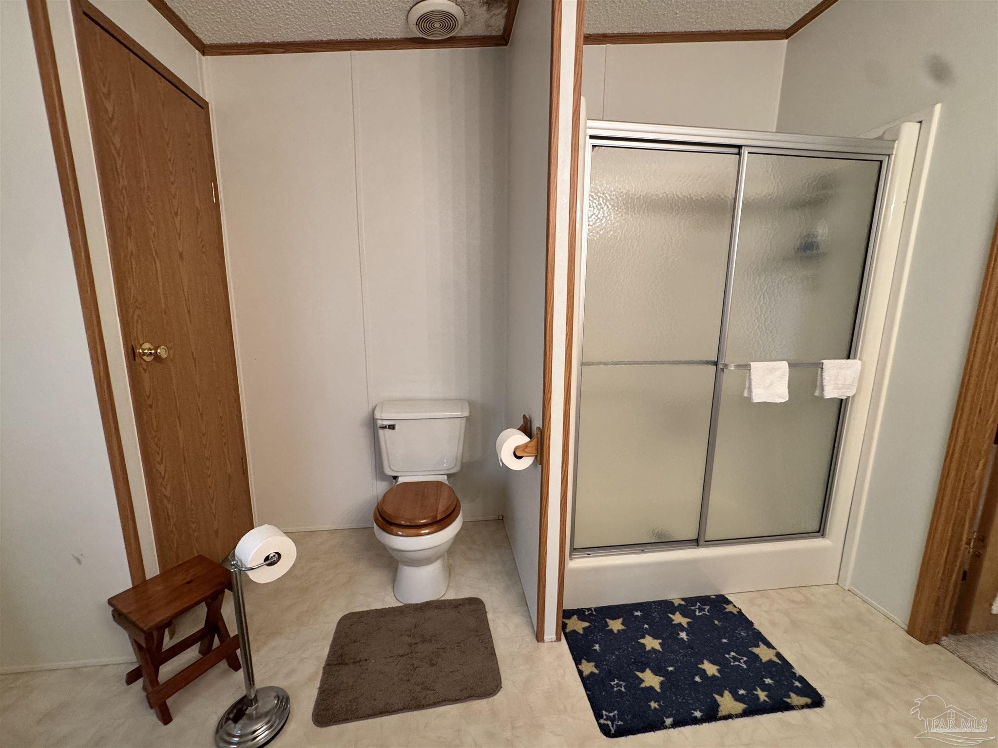 6512 Winston Brown Road Milton, FL 32570 - Photo 17 of 37 a bathroom with a sink and a mirror