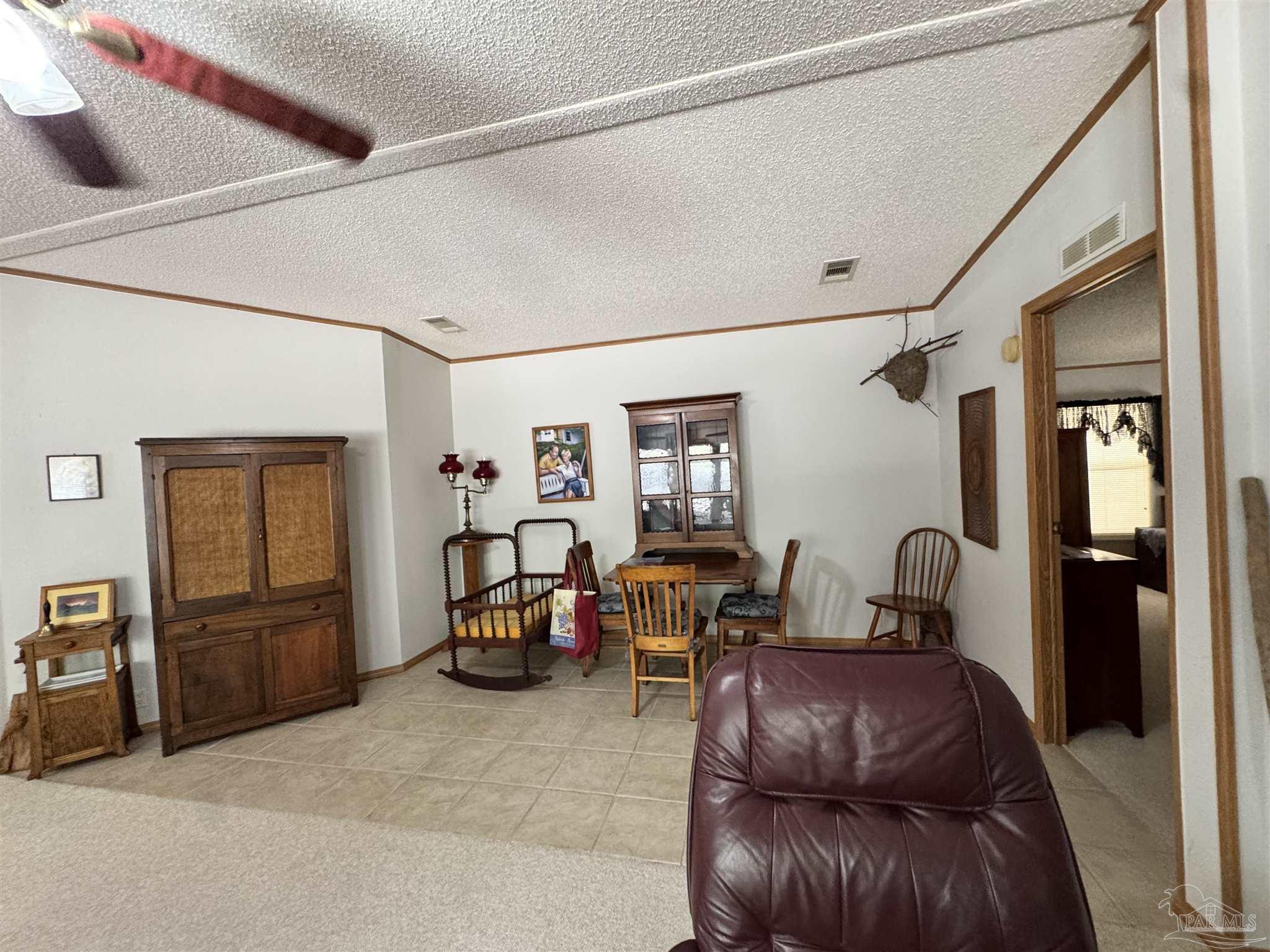 6512 Winston Brown Road Milton, FL 32570 - Photo 20 of 37 a living room with furniture