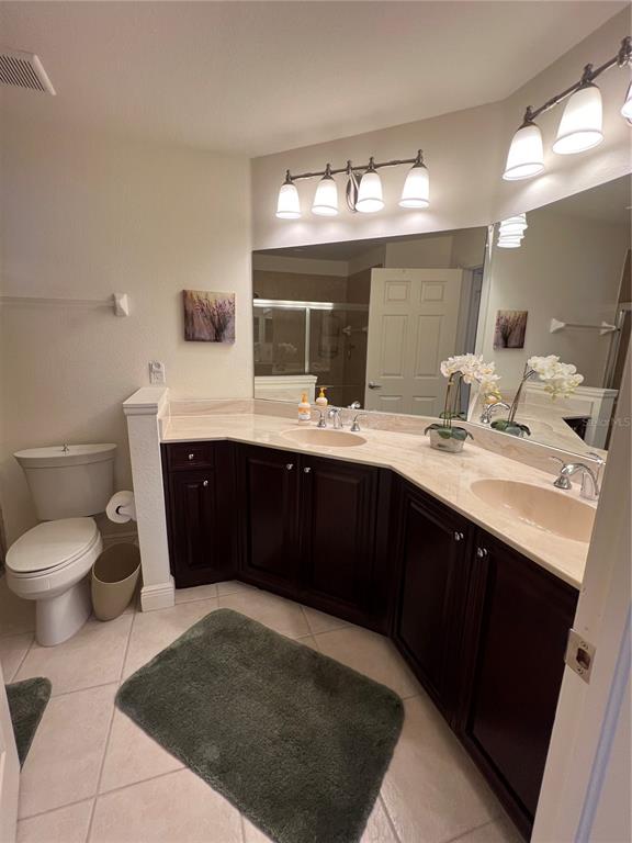 240 West End Drive, Unit 611 Punta Gorda, FL 33950 - Photo 15 of 19 a bathroom with a sink and a mirror
