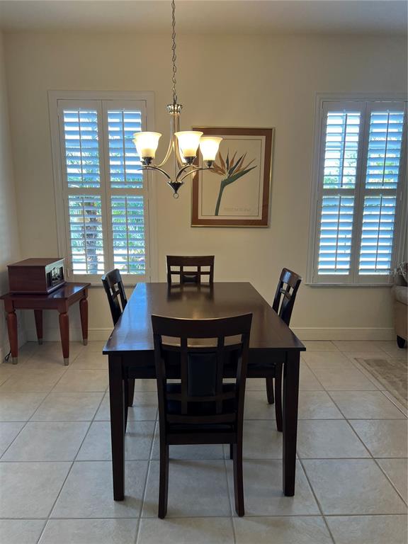 240 West End Drive, Unit 611 Punta Gorda, FL 33950 - Photo 6 of 19 a view of a dining room with furniture