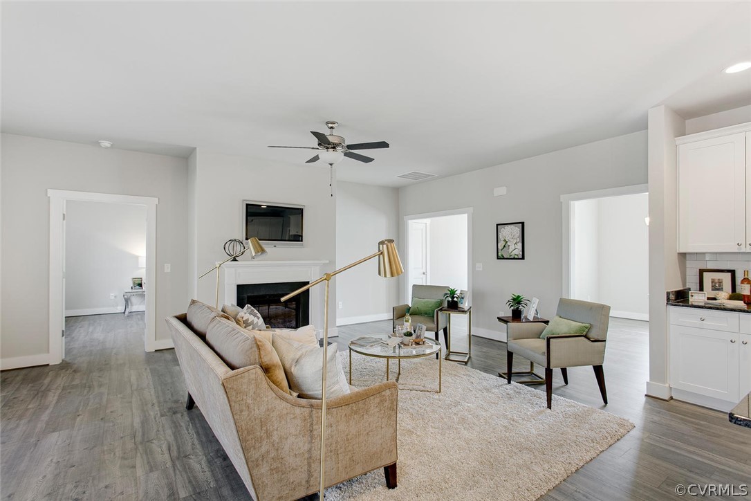 11519 Avening Road Midlothian, VA 23112 - Photo 3 of 19 a living room with furniture and a fireplace