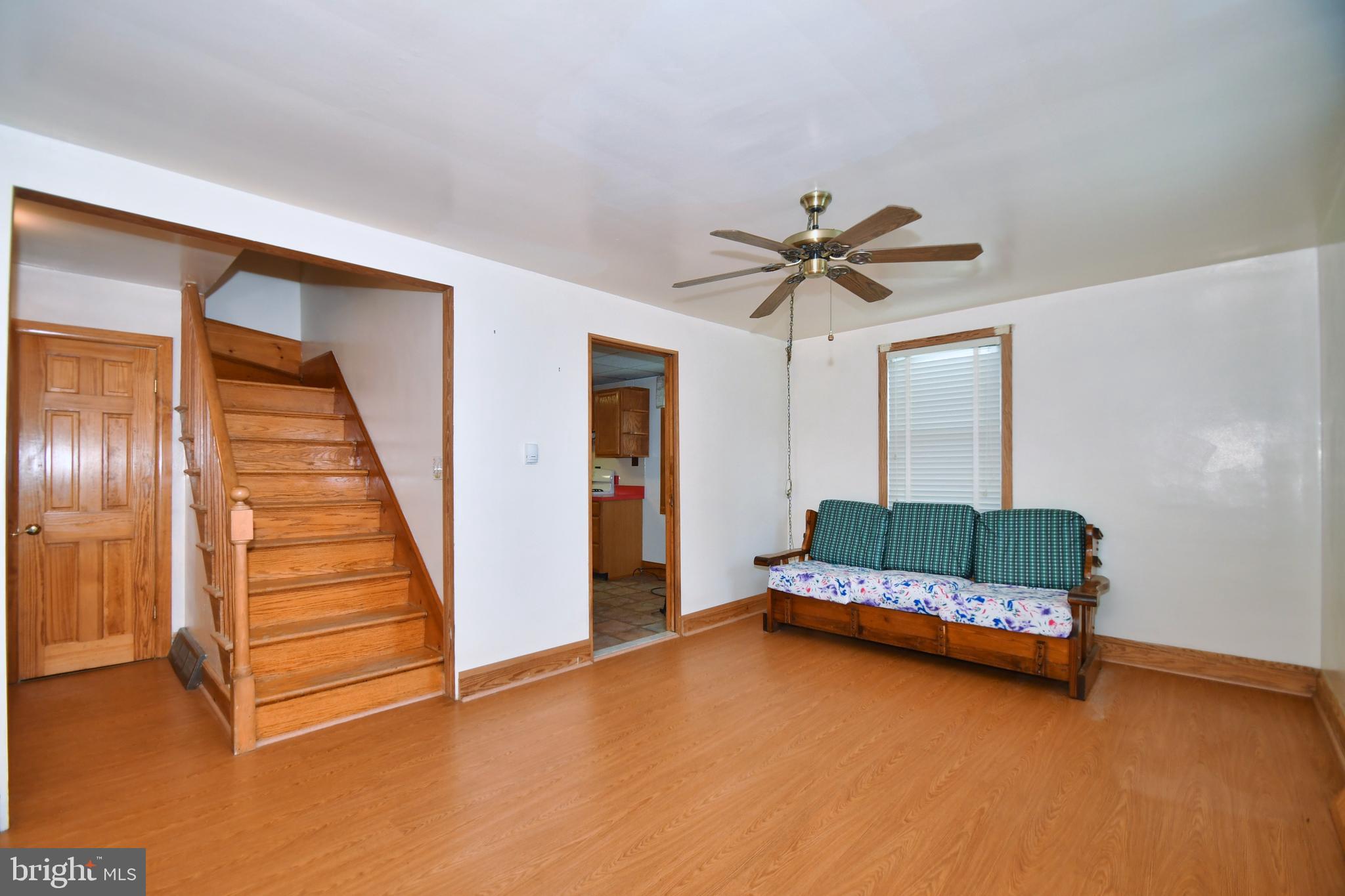 2022 Oakland Road Baltimore, MD 21220 - Photo 8 of 47 Living Room With Stairs to Upper Level