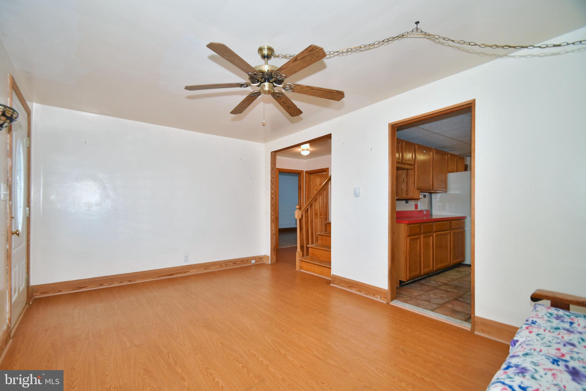 2022 Oakland Road Baltimore, MD 21220 - Photo 10 of 47 Living Room Exits to Kitchen, 2 Bedrooms and Bath