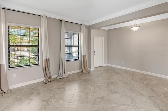 a large kitchen with kitchen island granite countertop a large counter top and stainless steel appliances
