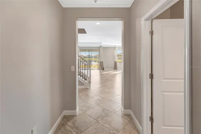 a bathroom with a granite countertop sink and washing machine