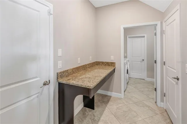 a bath tub sitting next to a window