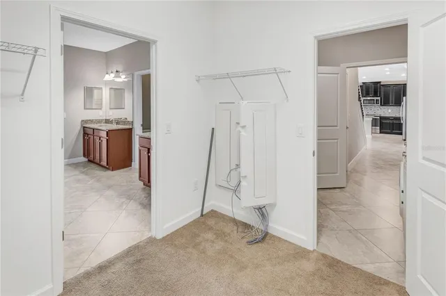 a view of an empty room with a large window