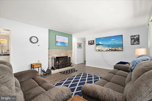 a kitchen with stainless steel appliances a white cabinets and stove