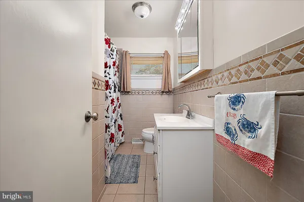 a bedroom with a bed and a table