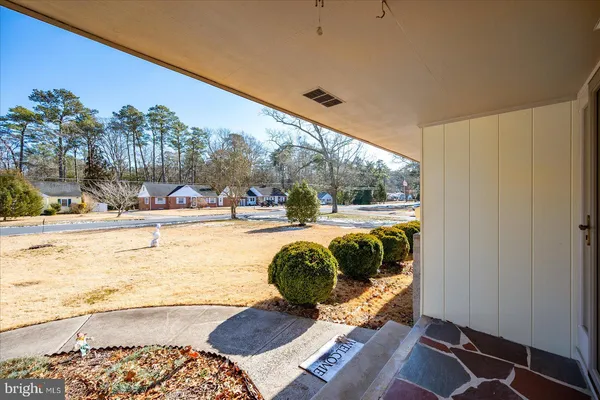 a front view of a house with a fence