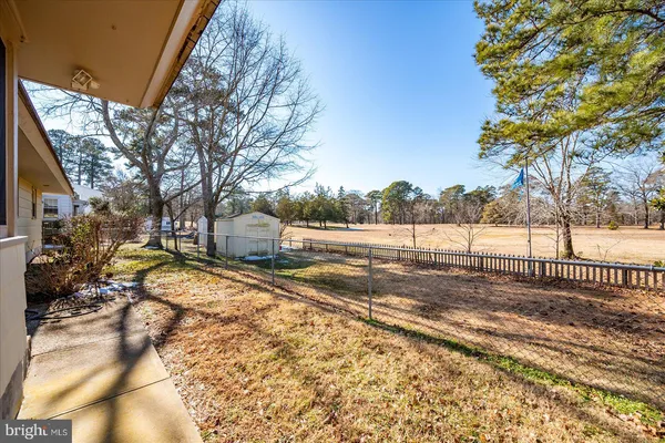 a view of a tiny house with backyard
