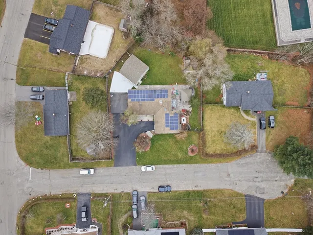 a view of a back yard of the house and trees